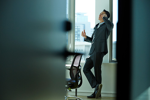 Businessman standing in a meeting room