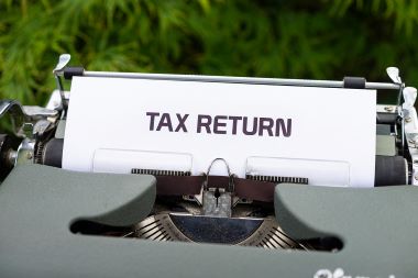 Tax return, typewriter, typing, paper, income, finance