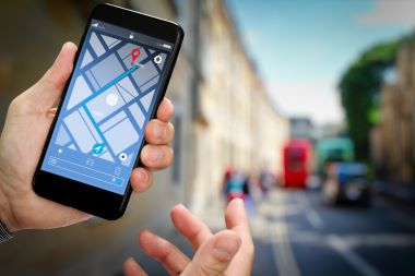Using GPS map navigation on smartphone application screen for direction to destination address.